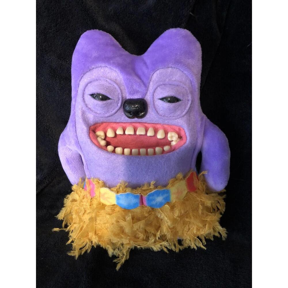 Fuggler “Greedy Grinner” Vacay Vibes Purple Hula Skirt 9” Plush — ZURU